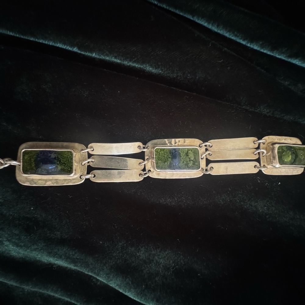 Elegant Silver Bracelet with Green Accents
